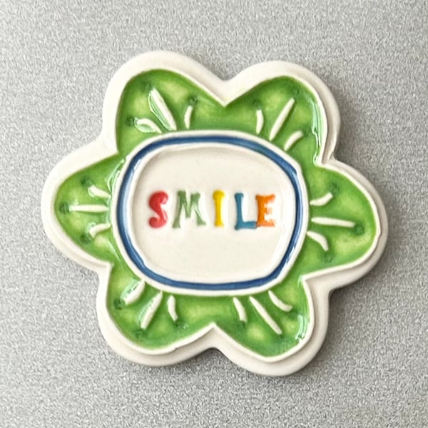 Large Smile pottery magnet green