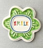 Large Smile pottery magnet green