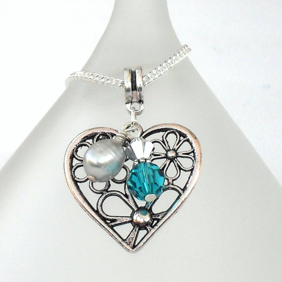 Heart charm necklace with silver pearl and swarovski crystal elements