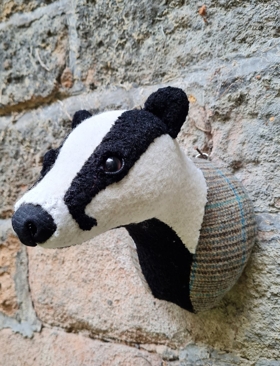 Faux badger wall mount in black, white and checked tweed