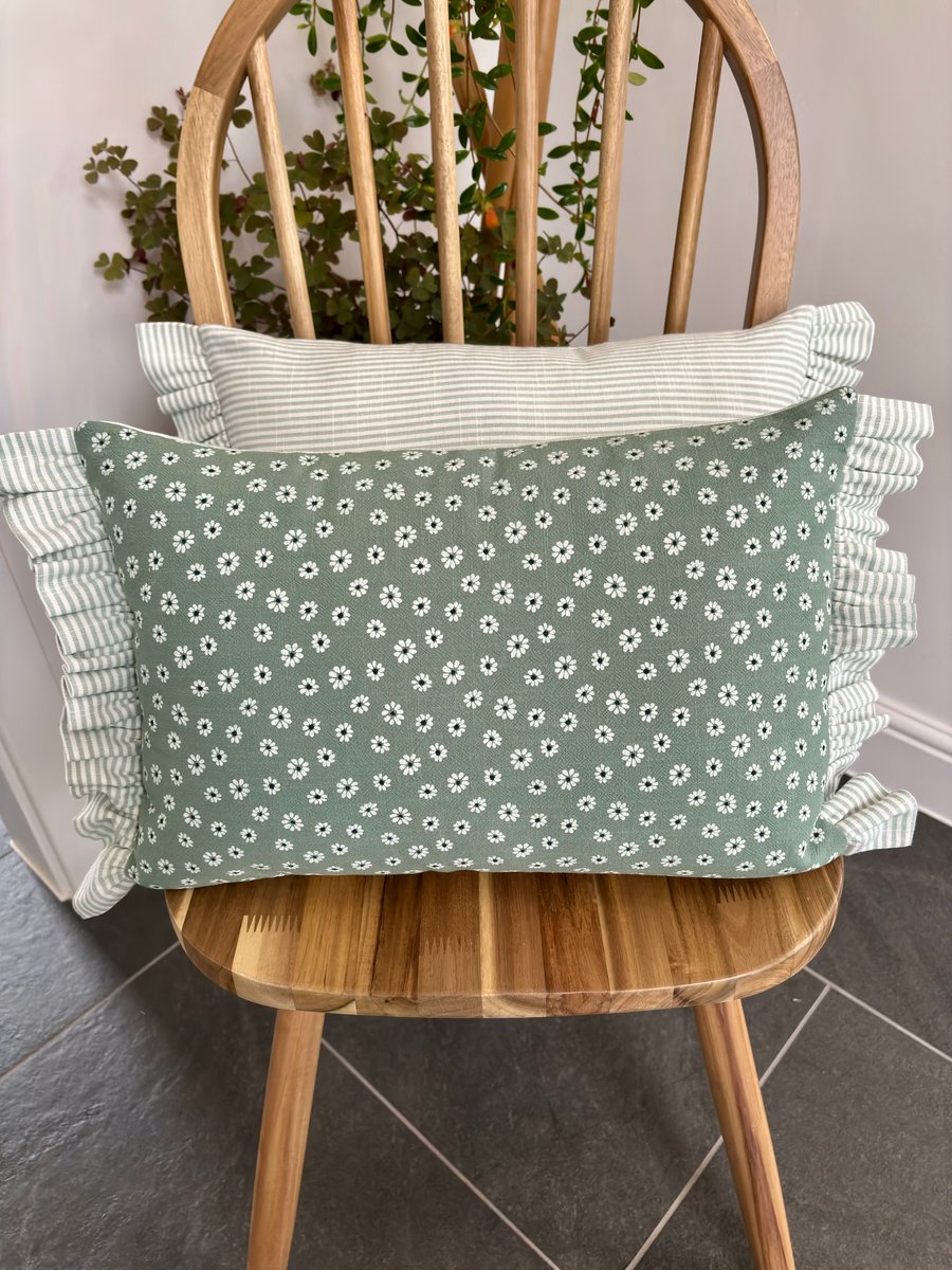 Frilled edge cushion cover with floral daisy print and stripes in green