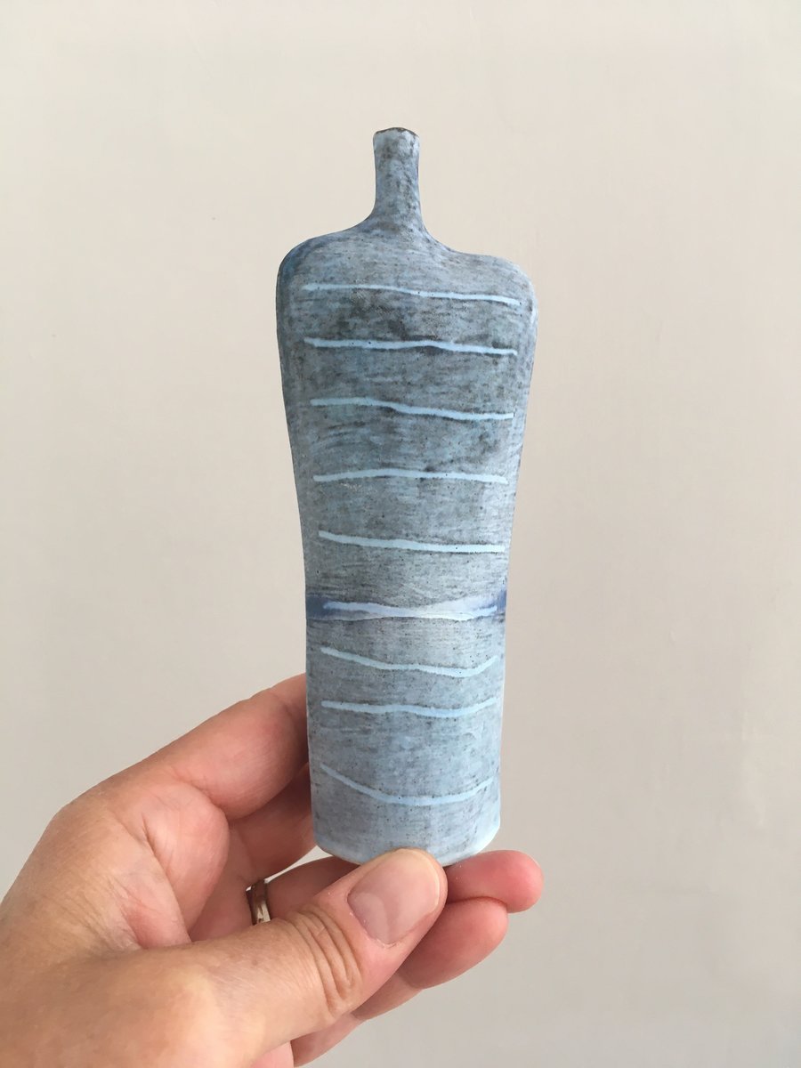 Tracks Bottle Slip Decorated onto Stoneware Ceramic