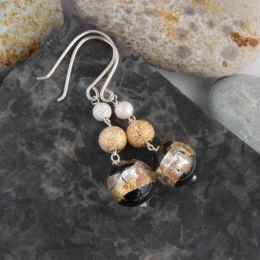 Black, silver and gold murano glass earrings
