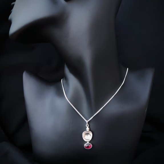 Sterling silver pendant with garnet