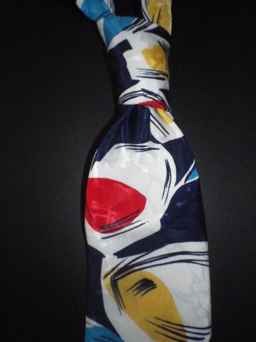 Strong coloured motifs on deep navy silk screen print tie, 9.5cm, free shipping