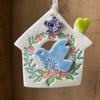 Small Ceramic bird house decoration with purple flower