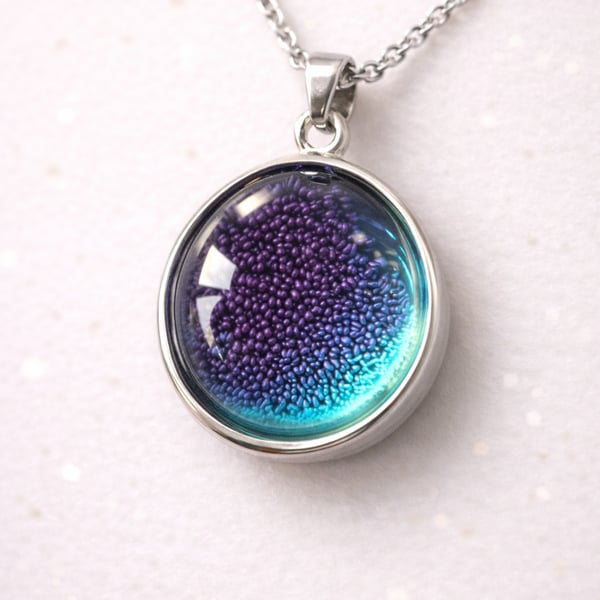 Handcrafted resin pendants stunning colours