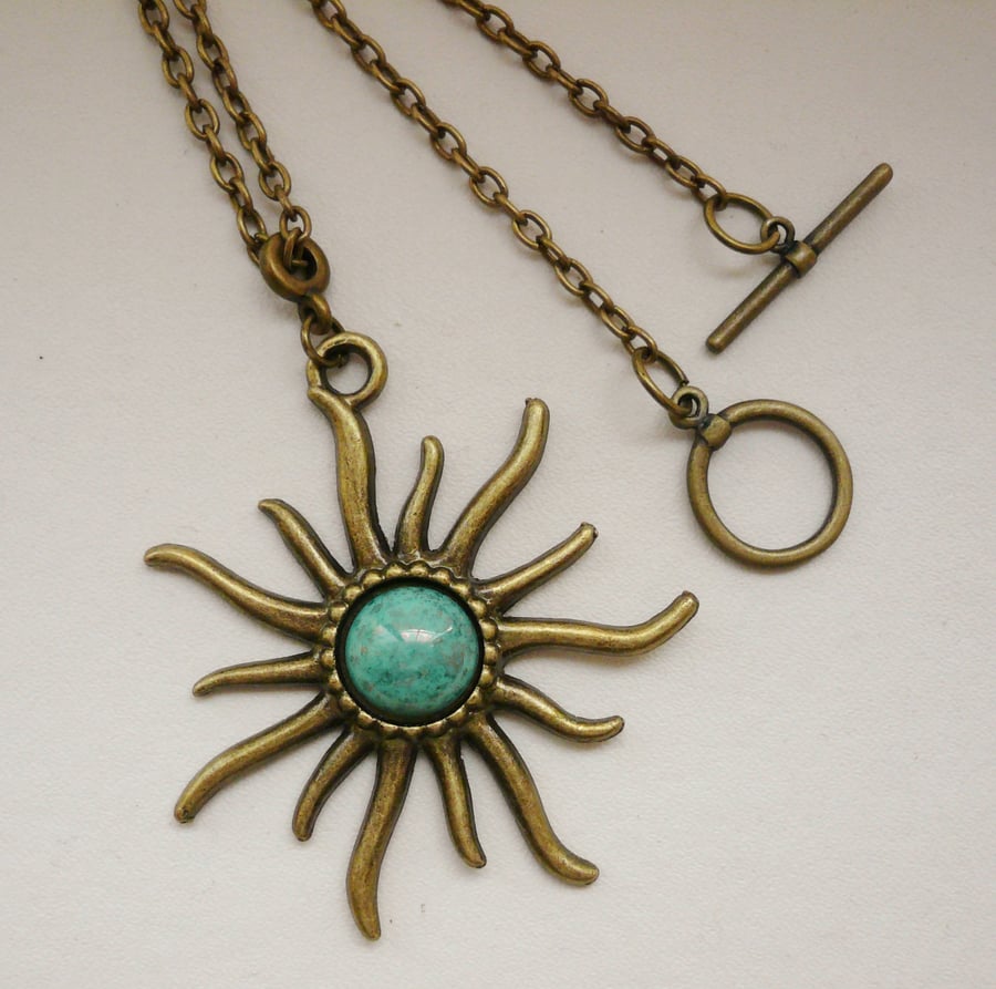 Antique Bronze and Turquoise Sun Pendant Necklace   KCJ718