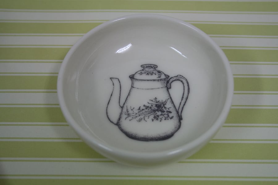 Porcelain dish with teapot image