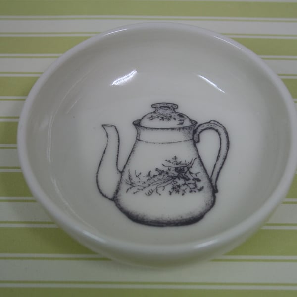 Porcelain dish with teapot image