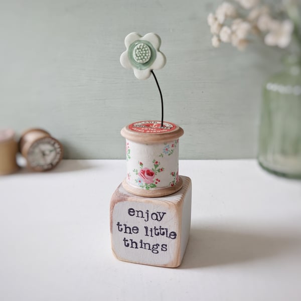 Clay Flower on a Vintage Bobbin 'enjoy the little things'