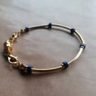 Lapis Lazuli, compass bracelet. Gold and rose. 