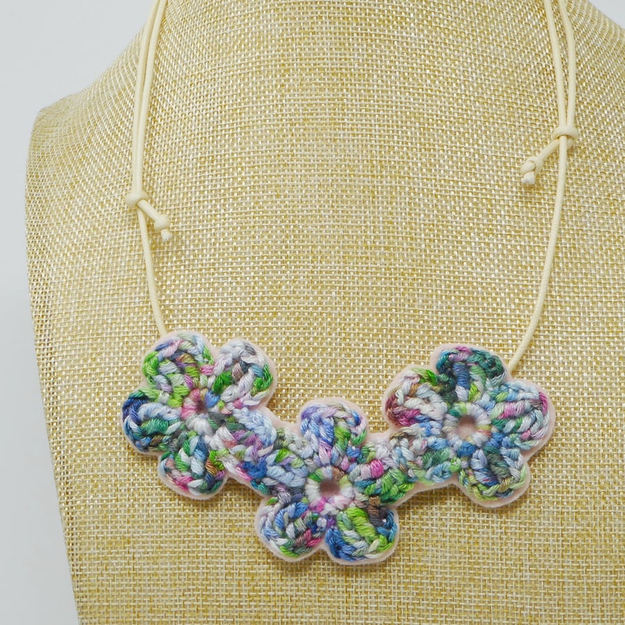 Crochet flower necklace in lilac and green