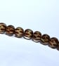 Handmade brown and beige lamp work glass beads - Image 9