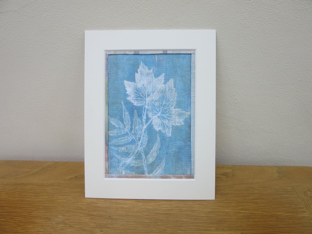 Printed leaf picture, fabric art, Pale blue and white, machine quilted