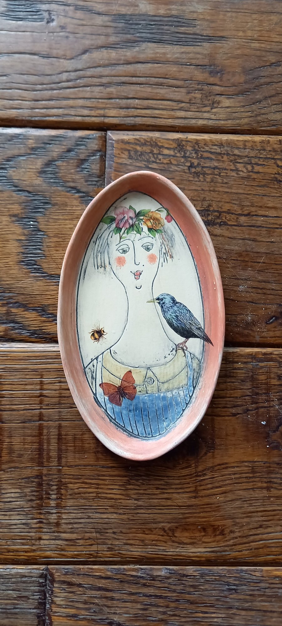 Figurative wall hanging .