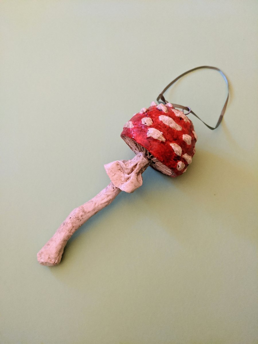 Red and white hanging toadstool decoration, Halloween decoration.