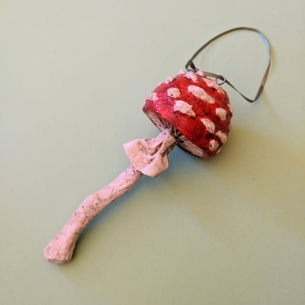 Red and white hanging toadstool decoration, Halloween decoration.