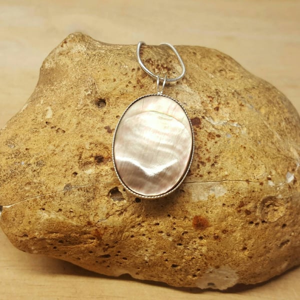 Black lip mother of pearl pendant. sterling silver.1st anniversary gemstone