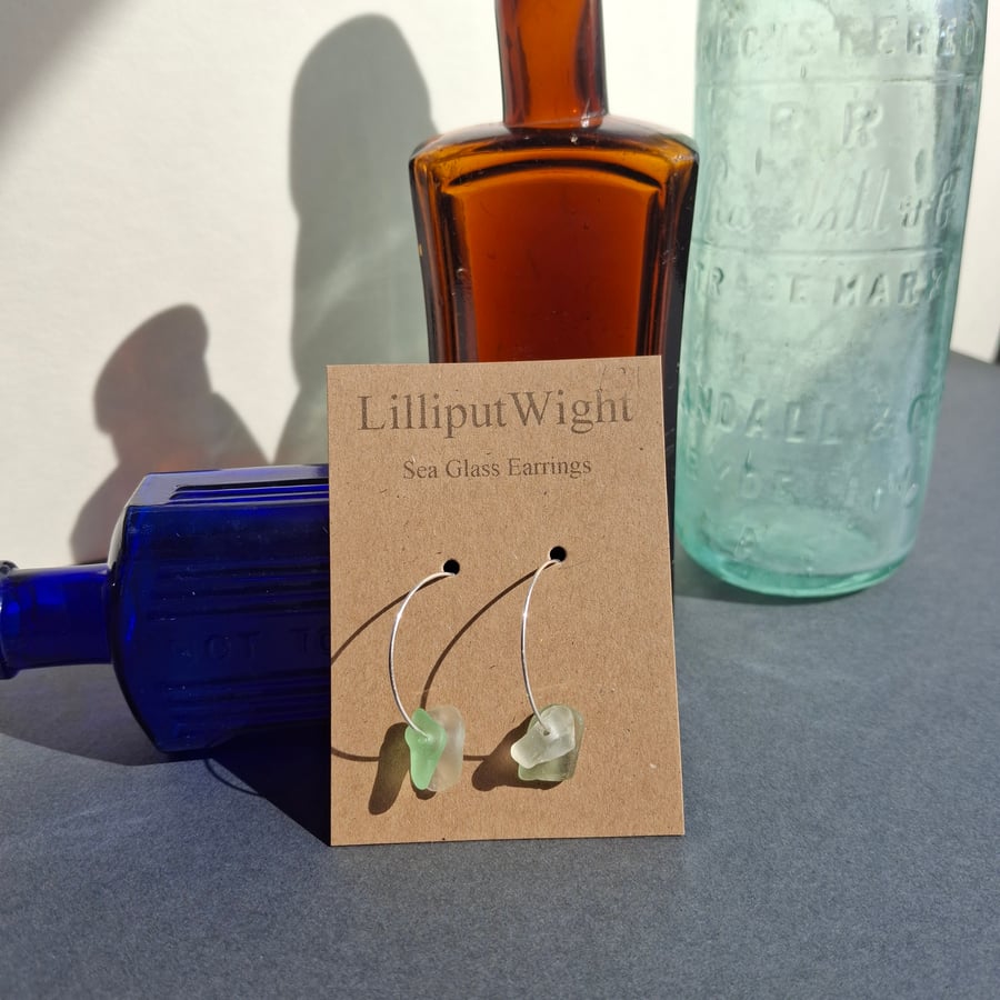 Sea foam and pale green coloured sea glass silver hooped earrings