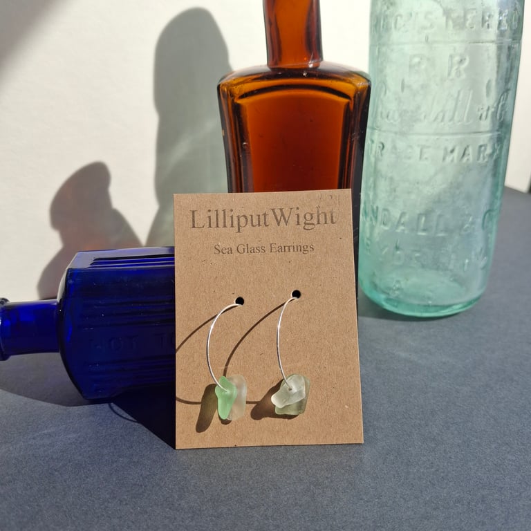 Sea foam and pale green coloured sea glass silver hooped earrings