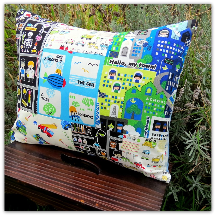 SALE!   A vibrant patchwork cushion. With inner cushion pad. Nursery.