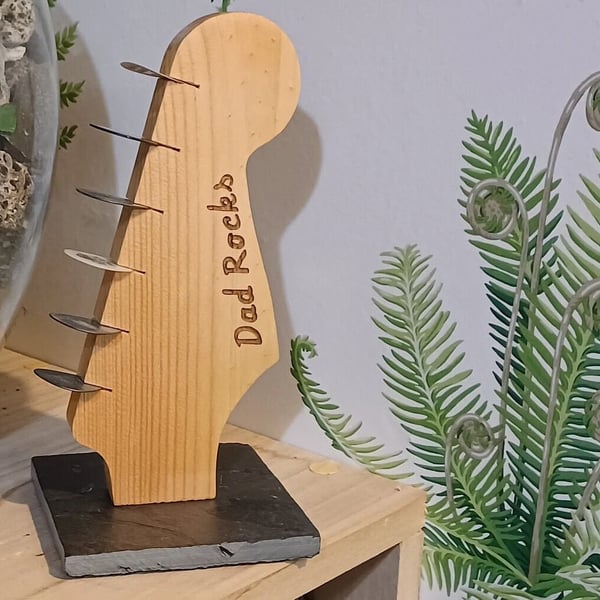 Personalised guitar pick holder in the style of a Stratocaster guitar headstock