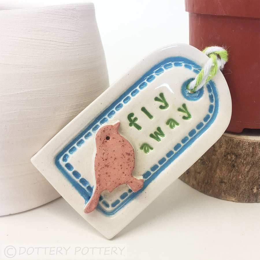 Ceramic gift tag decoration with bird pottery gift tag