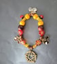 Elasticated nature-inspired beaded charm bracelet with pentacle - Image 4