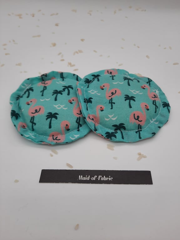 Heat pads  - hand warmers, rice filled in green flamingo fabric.   