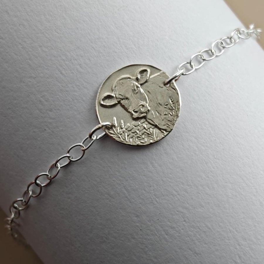 Image of Cow Engraved Sterling Silver Coin Bracelet