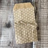 Small kraft bags with white polka dots