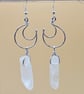 Sterling silver crescent moon dangle earrings with raw clear quartz points