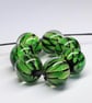 Handmade green snakeskin patterned lamp work glass beads - Image 2