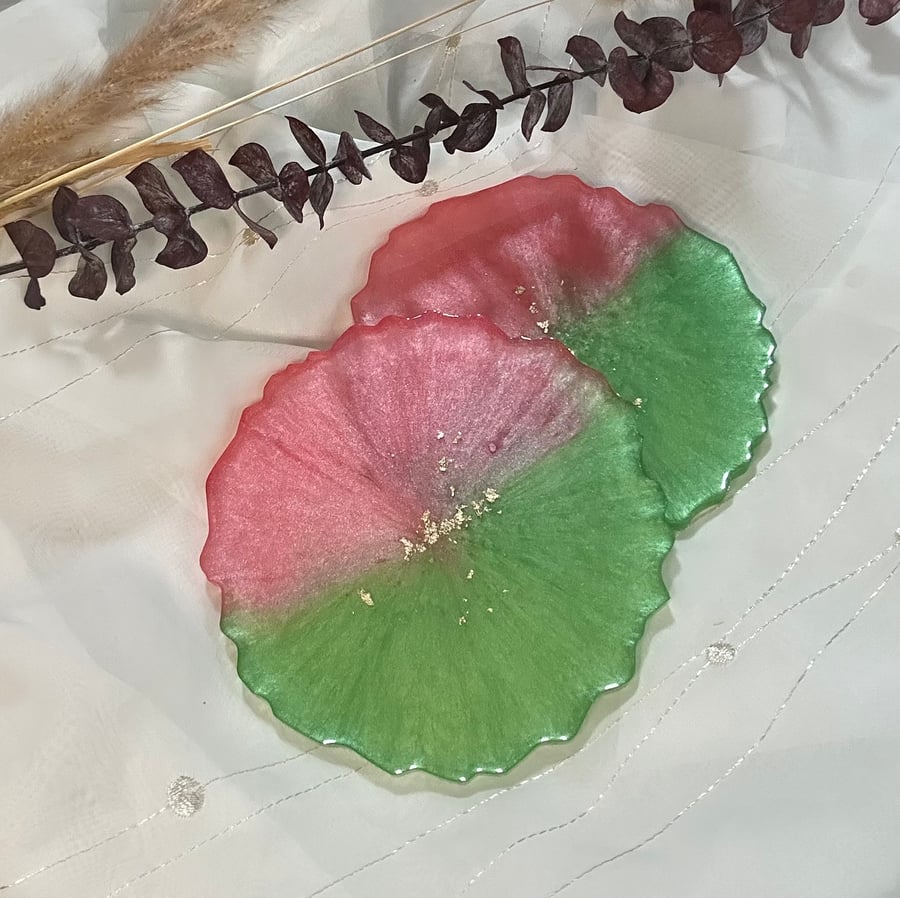 Pink and green round resin coasters