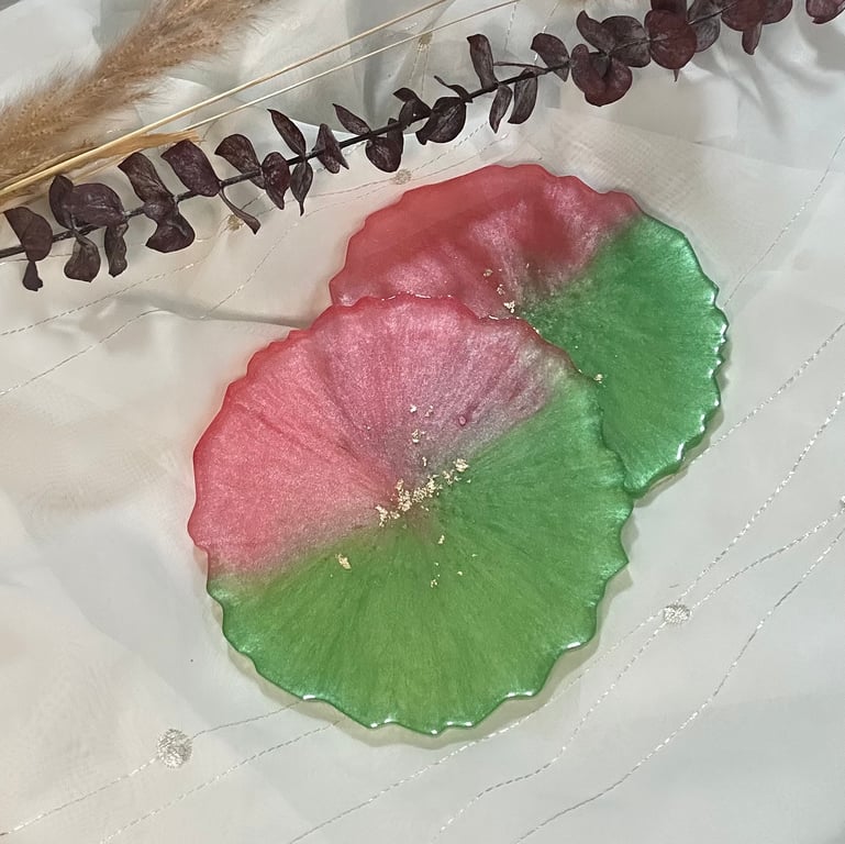 Pink and green round resin coasters