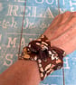 Wide fabric cuff bracelet in retro brown design - Image 5