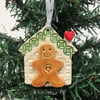 Ceramic gingerbread house decoration with Green roof