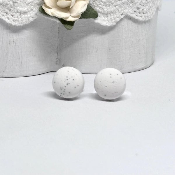 Matte White Mini Button Stud Earrings with a speckled finish