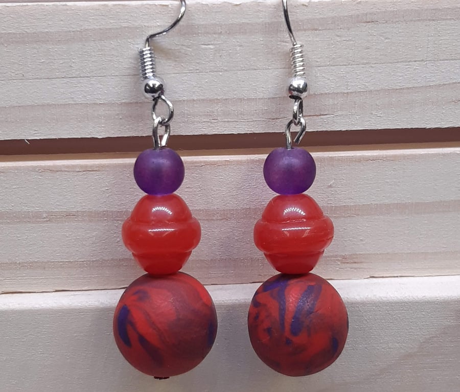 Poppy red and purple dangly earrings