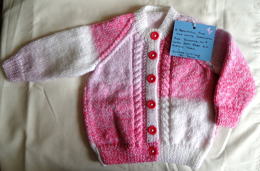 Pink and White Baby Cardigan.