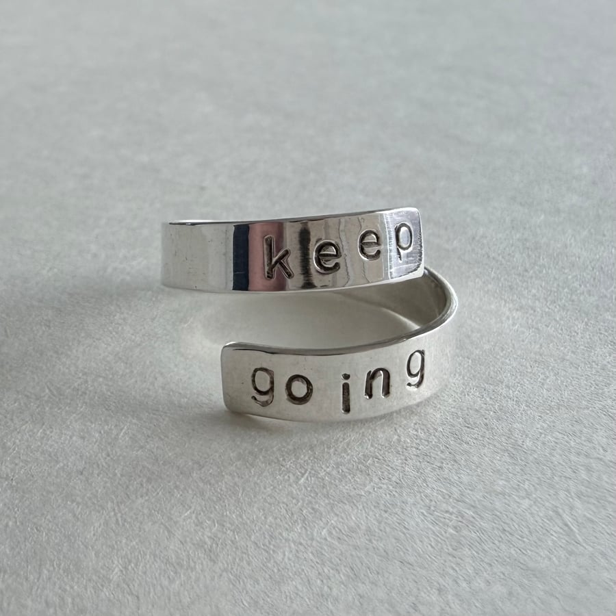 Sterling silver ‘keep f—king going’ wrap ring 