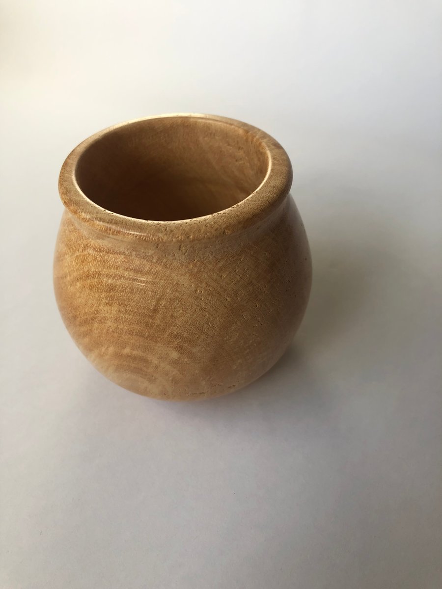 Hand turned small Sycamore pot.