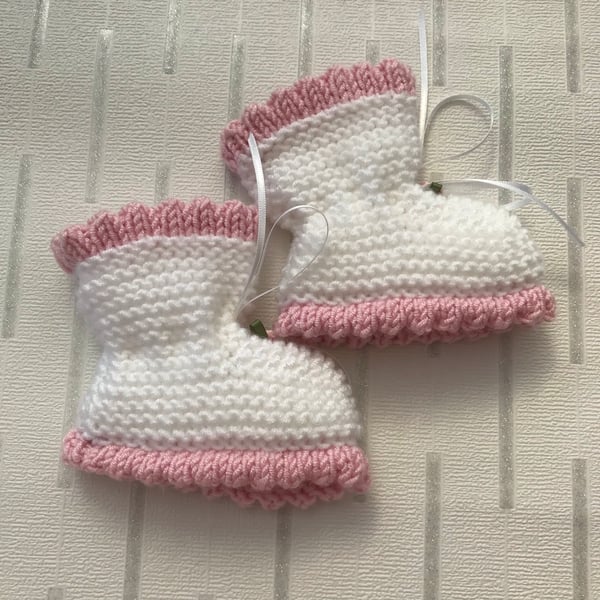 White and pink bootees with rose motif