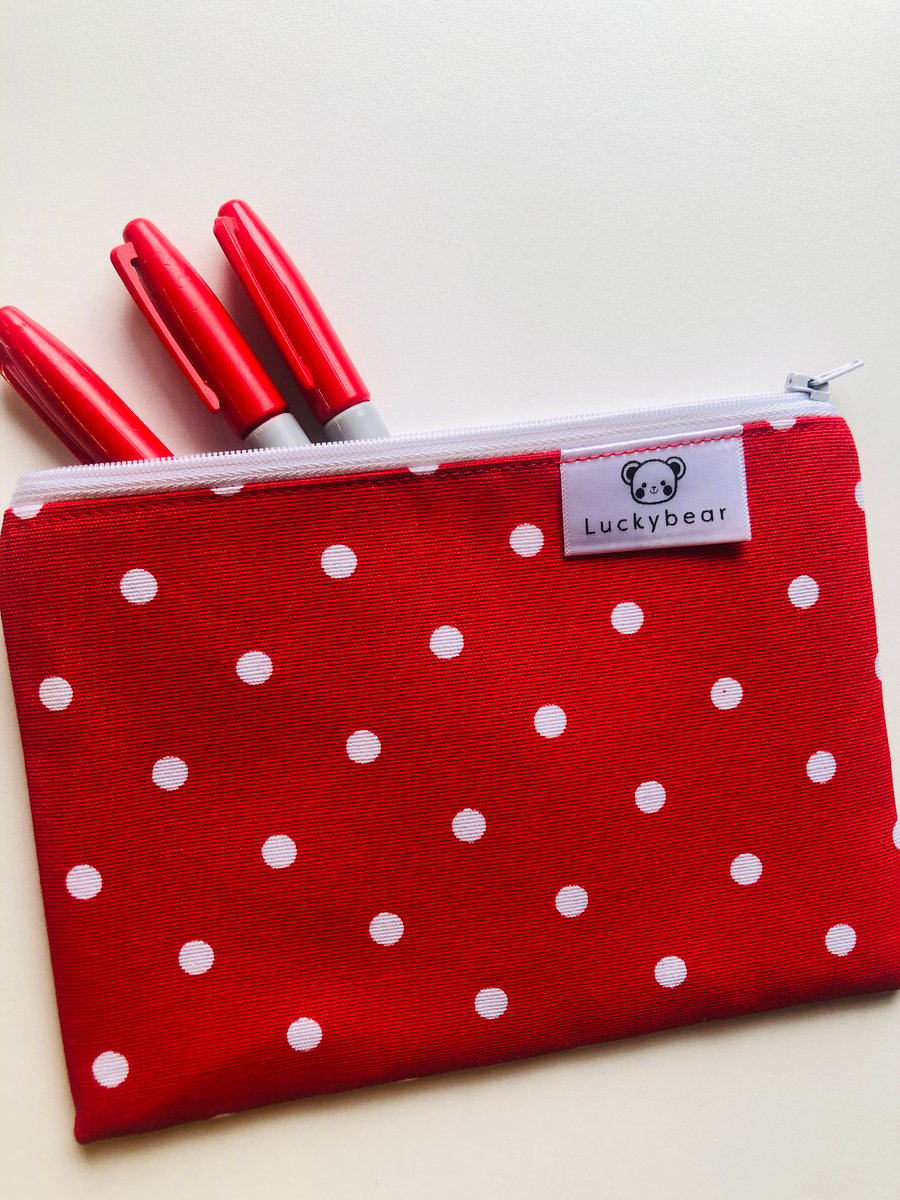 Red spotty zip pouch (small); bright red pouch with polka dots