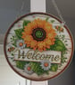 Welcome hanging sign