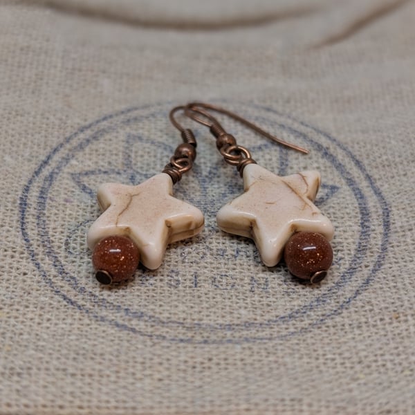 Cream howlite star and goldstone bead earrings with copper ear wires