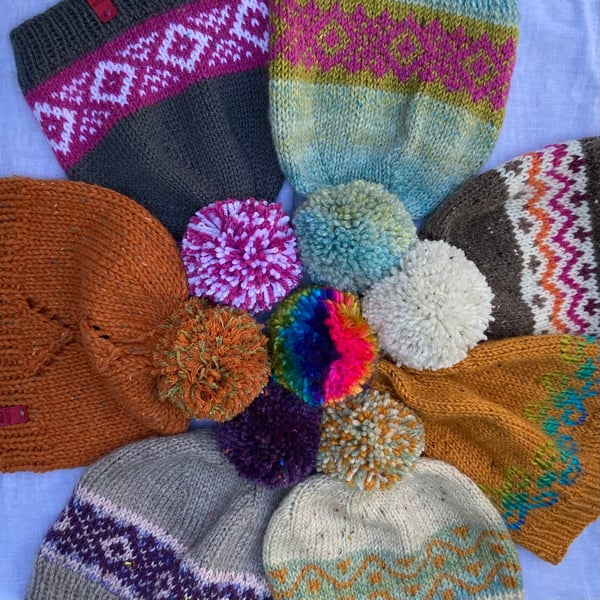 Winter warmer knitted beanies with pompoms
