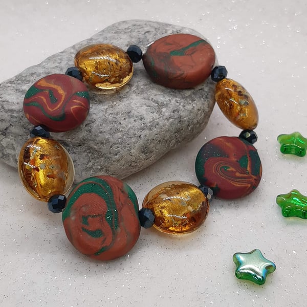 Copper, red and green disc bracelet