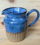 Large wavy blue carved jug (shoulder) - Image 1